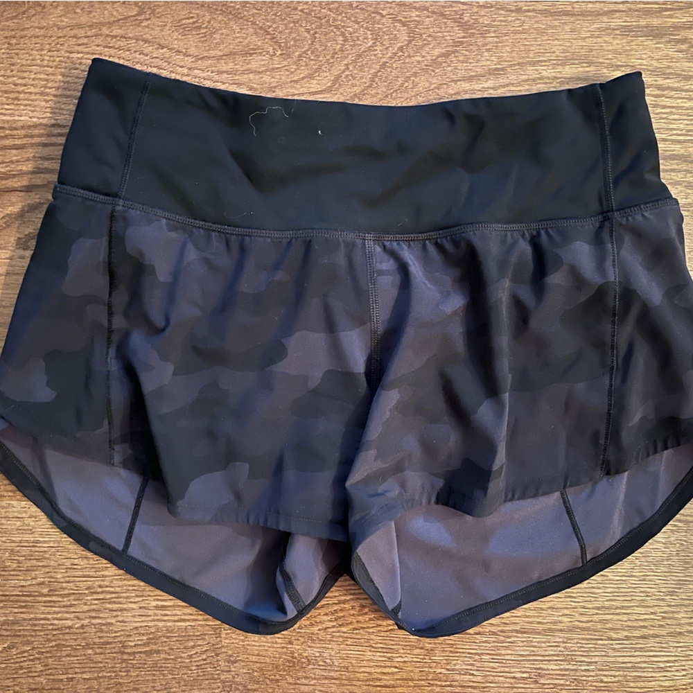 Lululemon Speed Up Shorts.  Hi rise.  Size 4, 2.5 in inseam. Black camouflage.